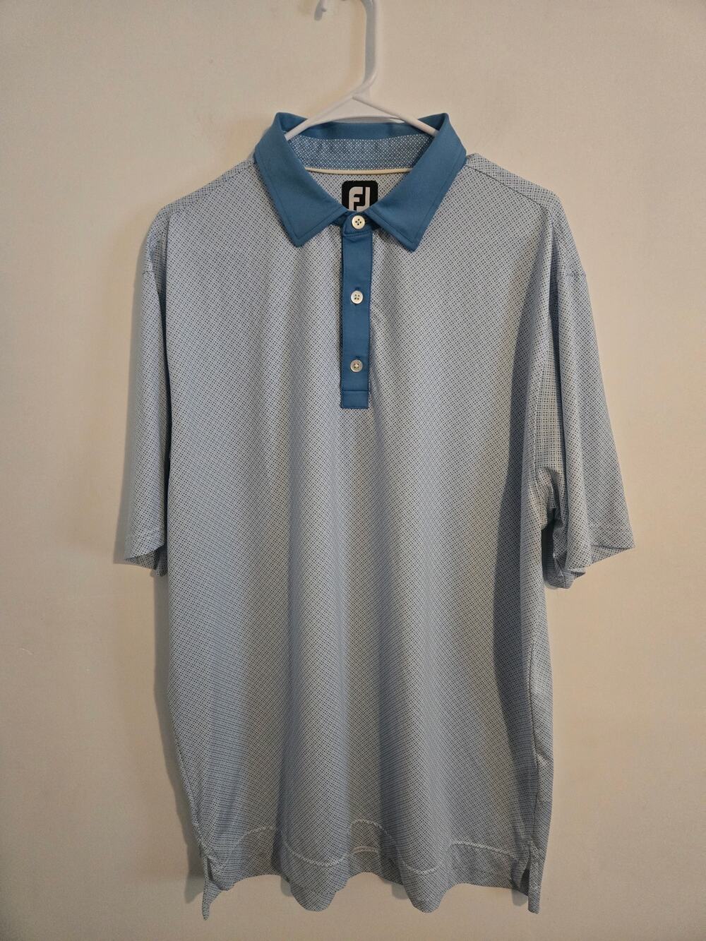 Footjoy mens polo golf shirt size L all over geometric print blue and white.